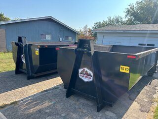30 yard dumpster rental delivered as two 15 yard cans in Greenville, TX